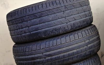 worn tires stacked for recycling Auto Draft